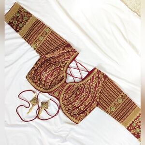 NWOT beautiful long sleeves maroon/gold heavy embroidery .